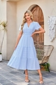 Macro detail of light blue tiered dress featuring V-neckline and textured striped fabric - Light Blue