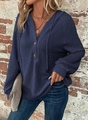 Close-up detail of dark blue waffle knit texture on women's V-neck drawstring hoodie - Navy Blue