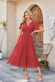 Detail of red tiered V-neck dress featuring a smocked high waist and textured fabric - S / Red