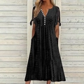 Close-up of V-neckline with white buttons and sleeve knot detail on a black dress - S / Black