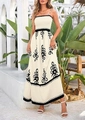 Detail van de gesmokte top en bohemian bloemenprint op de zomerse maxi-jurk - XL / Broken Wit
