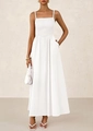 Detail of white smocked bodice and thin straps on a flowing summer maxi dress - S / White