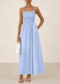 Detail of light blue smocked sundress featuring delicate straps and side pockets - Light Blue