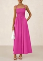 Detail of smocked magenta midi dress featuring spaghetti straps and side pockets - Rose Red
