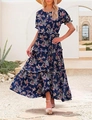 Close-up of bohemian floral print dress featuring layered ruffles and puff sleeves - Navy Blue Floral
