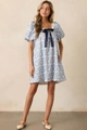 Detailed view of square neck dress with lace trim and dark blue ribbon bow accent - S / Blue
