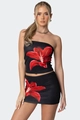 Close-up of slim-fit tube top and mini skirt featuring a large red lily floral print - S / Black Floral Style 1