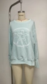 Detail of light blue crewneck sweatshirt featuring sand dollar print and ribbed cuffs - Light Blue (Contrast Stitch)