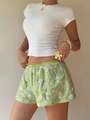 Detailansicht hellgrüner Pailletten-Shorts mit Blumenstickerei und elastischem Bund - S / Grün