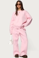 Detail of pink two-piece tracksuit with lace heart patch on sweatshirt and wide-leg pants - S / Top And Bottom / Pink