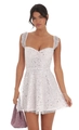 Detail of white sequin dress featuring a sweetheart neckline and ruffled strap design - S / White