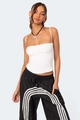 Detail of white corset camisole paired with black striped joggers and layered necklace - S / Tops / White
