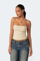 Close-up view of a model in a beige corset top with square neck and fine straps - S / Tops / Off White