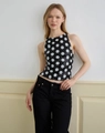 Nahaufnahme eines schwarzen Pailletten-Halterneck-Tops mit großen weißen Punkten für Damen - S / Schwarz