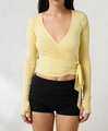 Slim fit pale yellow wrap top with long sleeves, V-neckline and side tie bow detail - S / Yellow