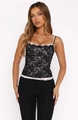 Close-up of black lace camisole top with delicate pink lace trim details and sheer texture - S / Tops / Black