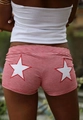 Detail of red striped slim shorts with white star patch embroidery on back pockets - S / Red