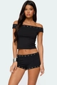 Detail of silver metal eyelets on black off-shoulder crop top and matching slim shorts set - S / Top And Bottom / Black
