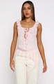 Detalle de top lencero de encaje rosa con tirantes con volantes y lazo frontal - S / Rosa