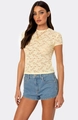 Close-up of intricate pale yellow floral lace texture on a round neck summer top - S / Tops / Yellow