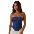 Close-up of dark blue polka dot corset top featuring a pointed hem and lace-up back detail - Dark Blue
