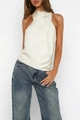 Detail view of champagne satin halter top with cross wrap neckline and smooth silk texture - S / White