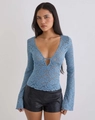Detailed close-up of the blue lace V-neck top showing sheer fabric and hollow textures - S / Tops / Blue
