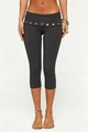 Close-up of wide fold-over waistband with decorative glossy buttons on high-waist capri leggings - S / Gray