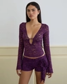 Detailed view of purple floral lace texture on long sleeve V-neck top with ribbon bow - S / Tops / Purple