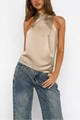 Detail of champagne satin halter top with cross neck design and silk-like texture - S / Champagne
