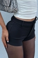 Women's slim fit high waist black shorts paired with a white tank top and chic handbag - S / Black