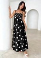 Detailed view of women's black and white polka dot maxi dress with thin straps - Polka Dot / S / Black
