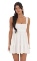 Detail of white mini dress featuring square neck design and multi-layer ruffled hemline - S / White