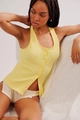 Detail of light yellow halter-neck ribbed knit top with decorative buttons and scalloped edges - S / Yellow