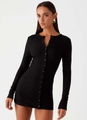 Detail of black ribbed knit texture and button-down front on a slim-fit long sleeve dress - S / Black