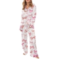 Detailed view of the soft bow print and premium button-down closure on women's pajamas - S / Top And Bottom / Pink