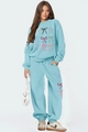 Détail du survêtement bleu clair avec motifs de nœuds colorés et texture en coton doux - S / Haut Et Bas / Bleu clair