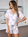 Detail of V-neck satin pajama top with heart print and black contrast piping trim - S / Top And Bottom / White