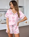 Detail of V-neck satin pajamas with pink heart prints and black contrast piping - S / Top And Bottom / Pink