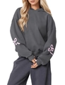 Detail of pink bow patterns on charcoal grey oversized hoodie with drop shoulders - S / Dark Gray