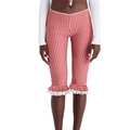 Detail of red gingham cropped leggings featuring ruffled hem and delicate white lace trim - S / Red