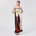 Detail view of women's strapless maxi dress featuring vibrant abstract floral print pattern - S / Pink