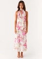 Detail of pink floral halter dress showing V-neckline and elegant silky fabric texture - S / Pink