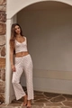 Detail of V-neck floral lounge set showing cropped camisole top and straight leg trousers - S / Top And Bottom / Red