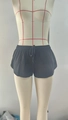 Primer plano de pantalones cortos deportivos de malla negra con cintura elástica y cordón - S / Negro