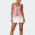 Detail of pink sequin halter top with floral embroidery and airy chiffon split hem - Pink