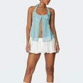 Detailed view of light blue halter top with sequin embroidery and white eyelet lace skirt - S / Blue