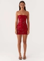 Detailed view of red tube mini dress with intricate floral sequin and bead embroidery - Red