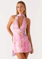 Detail of pink floral halter dress showing deep V-neckline and silky satin print fabric - S / Multicolor Pattern