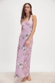 Detail of purple floral long dress featuring lace patchwork and halter neck design - S / Purple